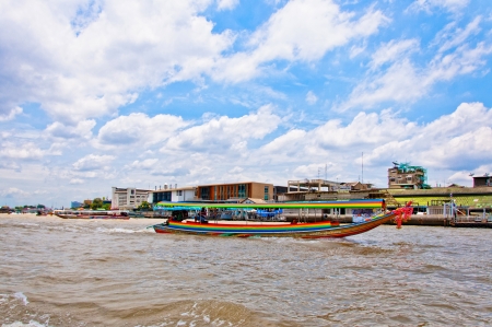 BANGKOK, THAILAND - AUGUST 08: typical long tail boat down Chao Praya river in Bangkok on 08 august 2012のeditorial素材