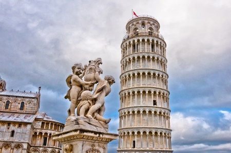 Leaning Tower of Pisa with angels statue, Tuscany - Italyの写真素材