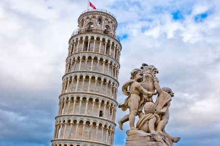 Leaning Tower of Pisa with angels statue, Tuscany - Italyの写真素材