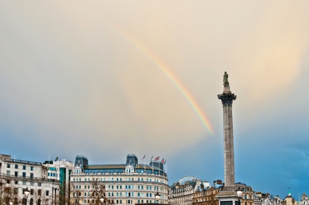 rainbow over Trafalgar Square in Londonの写真素材