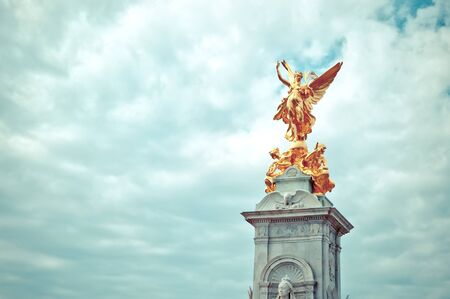 detail of Victoria Memorial in London with dramatic sky backgroundの写真素材