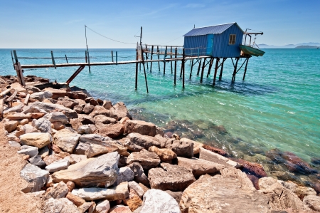 blue fishermen hut on Tuscany coast の写真素材