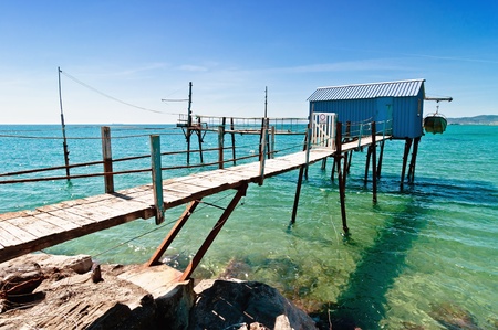 blue fishermen hut on Tuscany coast の写真素材