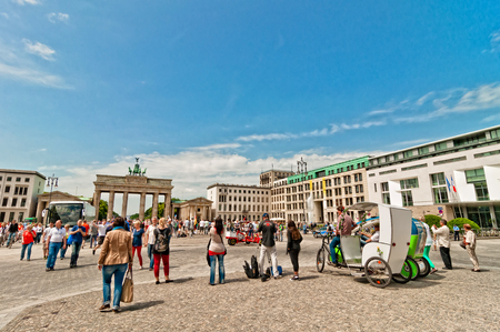 Berlin, Germany - June 7, 2013  tourists in Brandenburg Gate and Pariser Platz on June 08, 2013 in Berlin, Germany  Named Brandenburger Tor, it s one of the few monuments that survived World War IIのeditorial素材