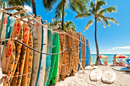 HONOLULU, HAWAII - SEPTEMBER 7, 2013  Surfboards lined up in the rack at famous Waikiki Beach in Honolulu  Oahu, Hawaii のeditorial素材