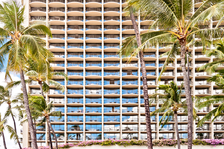 WAIKIKI, HAWAII - SEPTEMBER 7, 2013  facade of Waikiki hotel with palms in Honolulu, Hawaii  Waikiki is Hawaii s most famous tourist destination のeditorial素材