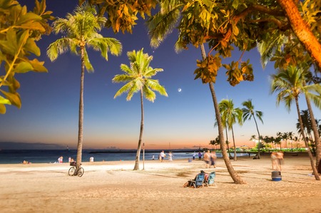 WAIKIKI, HAWAII - SEPTEMBER 7, 2013  sunset time in Waikiki beach, Honolulu, Hawaii  Waikiki white...
