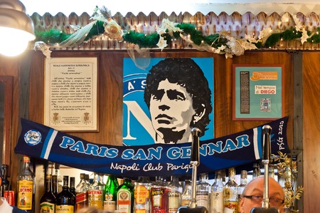 NAPLES, ITALY - JANUARY 3, 2014  tribute to Maradona in typical bar, in Naples, Italy  Maradona has played in Napoli Football team for 8 years and is considered to be the best football player of all timeのeditorial素材