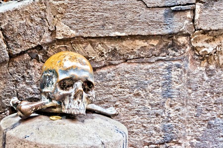 skull on the outside wall of Santa Maria delle Anime del Purgatorio Church in Naples, Italyの写真素材
