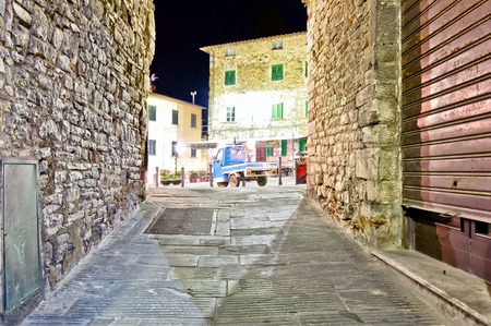 CAMPIGLIA MARITTIMA, ITALY - FEBRUARY 18, 2014  night view of medieval street in Campiglia Marittima, Tuscany  Campiglia is a Tuscany municipality located about 90 kilometres southwest of Florenceのeditorial素材