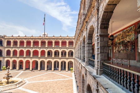 MEXICO CITY, MEXICO - APRIL 29, 2014: tourists visit National Palace in Mexico City, Mexico. The building is located on Mexico Cityのeditorial素材