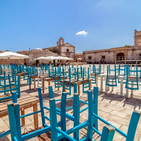 MARZAMEMI, ITALY -  AUGUST 19, 2014: tourists visit main square in Marzamemi, Italy. It is a small fishing village just a few kilometres up the coast from Italyのeditorial素材