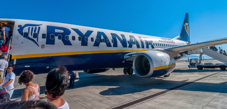 PALERMO, ITALY - AUGUST 27, 2014: passengers boarding Ryanair Jet airplane in Palermo airport, Italy. Ryanair is the biggest low-cost airline company in the world.のeditorial素材
