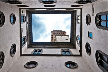 Palazzo Vecchio architecture and geometries seen from courtyard in Florence, Italy.の写真素材