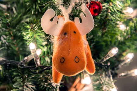 detail of Christmas tree decorated with handmade animal decorationの写真素材