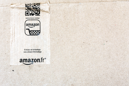 MILAN, ITALY - JANUARY 3, 2015: detail of delivered Amazon parcel in Milan, Italy. Amazon.com is the world's largest online retailer.のeditorial素材