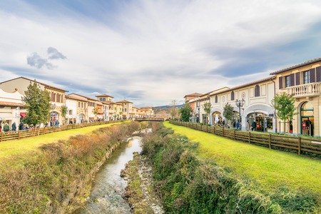 BARBERINO DI MUGELLO, ITALY - January 24, 2015: tourists shop at McArthurGlen Designer Outlet in Barberino di Mugello, Italy. Designer Outlet are located across Europe and offer discounts and special promotionsのeditorial素材