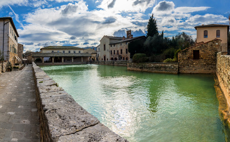 BAGNO VIGNONI, ITALY - January 25, 2015: old thermal baths in the heart of medieval village in Bagno Vignoni, Italy.  In 2004 Bagno Vignoni was added to the UNESCO list of World Heritage Sites.のeditorial素材