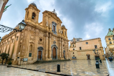 MARSALA, ITALY - FEBRUARY 22, 2015: day view of main square and Cathedral in Marsala, Italy. Marsala Cathedral, started in 1628, was built on a Norman implant dated to 1176.のeditorial素材