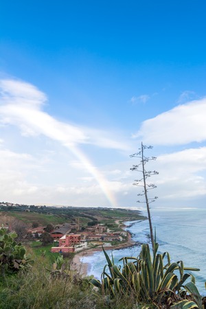 SCIACCA, ITALY - FEBRUARY 22, 2014: panoramic view of coastline with dramatic sky in Sciacca, Italy. Sciacca is known as the city of thermal baths since Greek domination in the 3rd and 4th centuries BCのeditorial素材