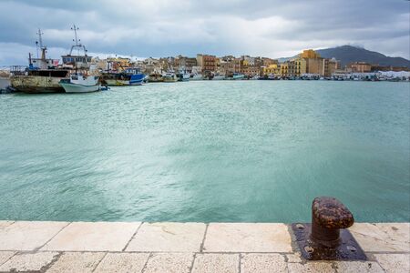 TRAPANI, ITALY - FEBRUARY 25, 2014: day view of harbor and waterfront in Trapani, Italy. The city is an important fishing port and the main gateway to the nearby Egadi Islandsのeditorial素材