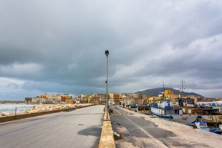 TRAPANI, ITALY - FEBRUARY 25, 2014: day view of harbor and waterfront in Trapani, Italy. The city is an important fishing port and the main gateway to the nearby Egadi Islandsのeditorial素材