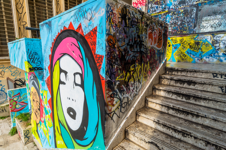 POTENZA, ITALY - MARCH 13, 2015: urban wall with street art and graffiti in Potenza, Italy. Potenza is the highest regional capital city in Italy.のeditorial素材
