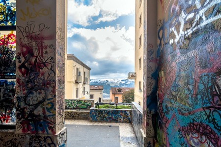 POTENZA, ITALY - MARCH 13, 2015: vandalized  urban wall with  tags and graffiti in Potenza, Italy. Potenza is the highest regional capital city in Italy.のeditorial素材