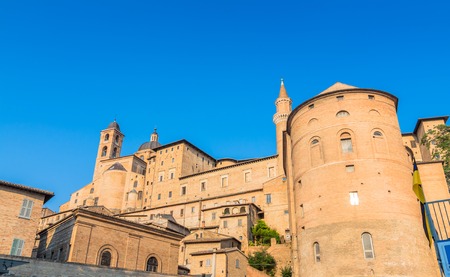 Urbino, Italy - August 13, 2015: view of skyline with Ducal Palace in Urbino, Italy. The historic center of Urbino was  represents the zenith of Renaissance art and architecture.のeditorial素材