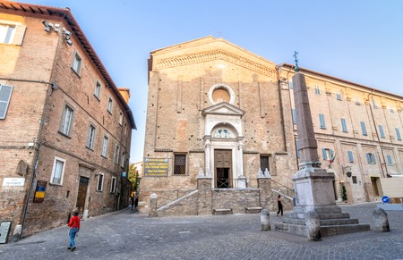 Urbino, Italy - August 13, 2015: tourist in front of San Domenico church in Urbino, Italy. The historic center of Urbino was represents the zenith of Renaissance architecture.のeditorial素材