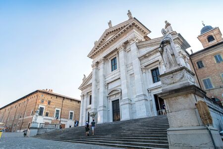 Urbino, Italy - August 13, 2015: tourists in front of Cathedral in Urbino, Italy. The historic center of Urbino was represents the zenith of Renaissance architecture.のeditorial素材