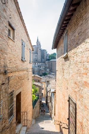 Urbino, Italy - August 13, 2015: street view with tourists in Urbino, Italy.のeditorial素材