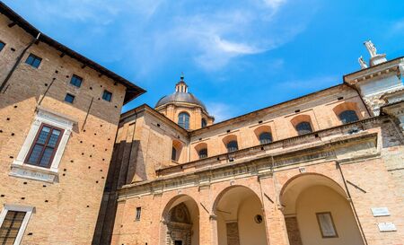 Urbino, Italy - August 14, 2015: Ducal Palace courtyard with tourists in Urbino, Italy.のeditorial素材
