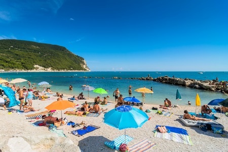 Sirolo, Italy - August 18, 2016: day view of famous San Michele beach in Sirolo, Italy. Mount Conero Natural Reserve Regional Park is a unique ecological environment.のeditorial素材