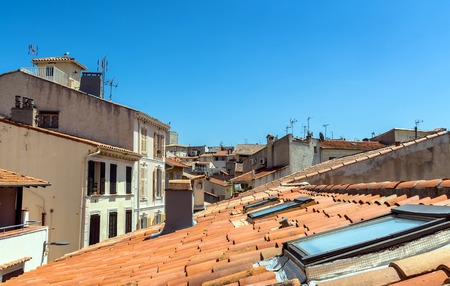 Antibes, France - June 26, 2016: day view of old town roofs and skyline in Antibes, France. It is...