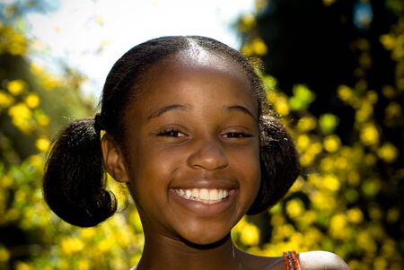 big smile from a young african american girlの写真素材