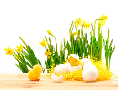 Funny cartoon chick, eggs and handmade with colorful Easter holidays flower