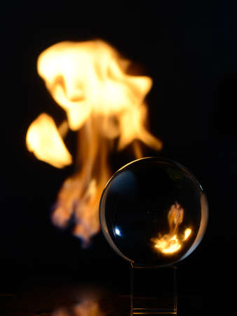 Fire ball figures cube black background magic spellsの写真素材