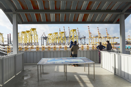 On an observation deck in Bremerhaven visitors can see the harbor facilitiesのeditorial素材