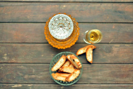 Wooden table with dessert and drinkの写真素材