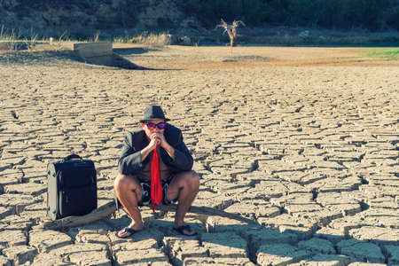 absent-minded traveler looking for your perfect holidayの写真素材