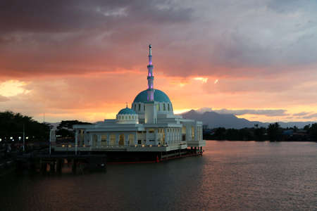 Mosque at sunset on the river - Kuching Sarawak Borneo Malaysia Asiaの写真素材