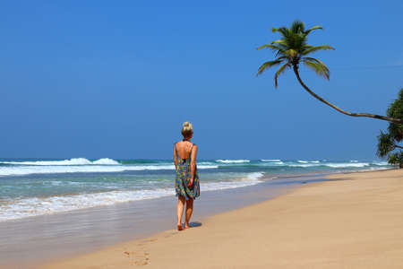 pretty girl on a dream beach with palm trees - Sri Lanka, Asiaの写真素材