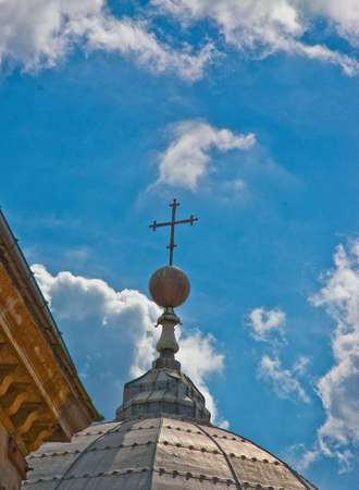 dome, cross and church in city of rome, italyの写真素材