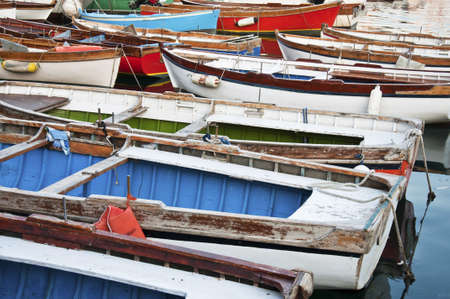 colored boats in the mediterranean seaの写真素材