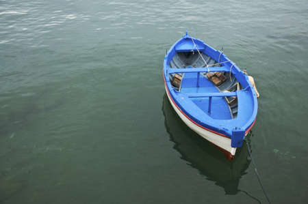 coloured boat in the mediterranean sea