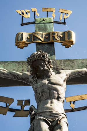 statue of christ on the charles bridge in prague