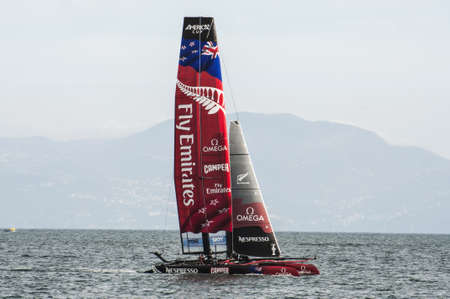 NAPLES - APRIL 13: the catamaran of team races during the america's cup world series competition on April 13, 2013 in Naples のeditorial素材