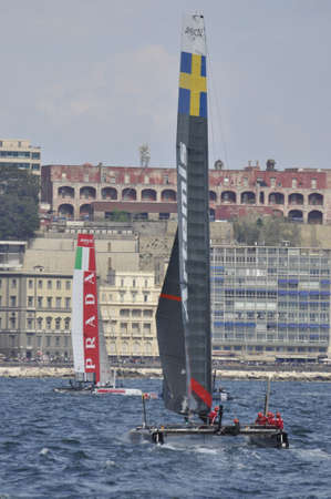 NAPLES - APRIL 20: the catamaran of team races during the americaのeditorial素材