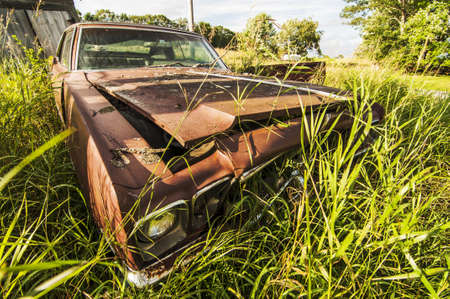 old wrecking car in countryside in Maine, Usaの写真素材